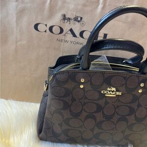 Mini Llli,Black Leather Handbag with Gold Accents